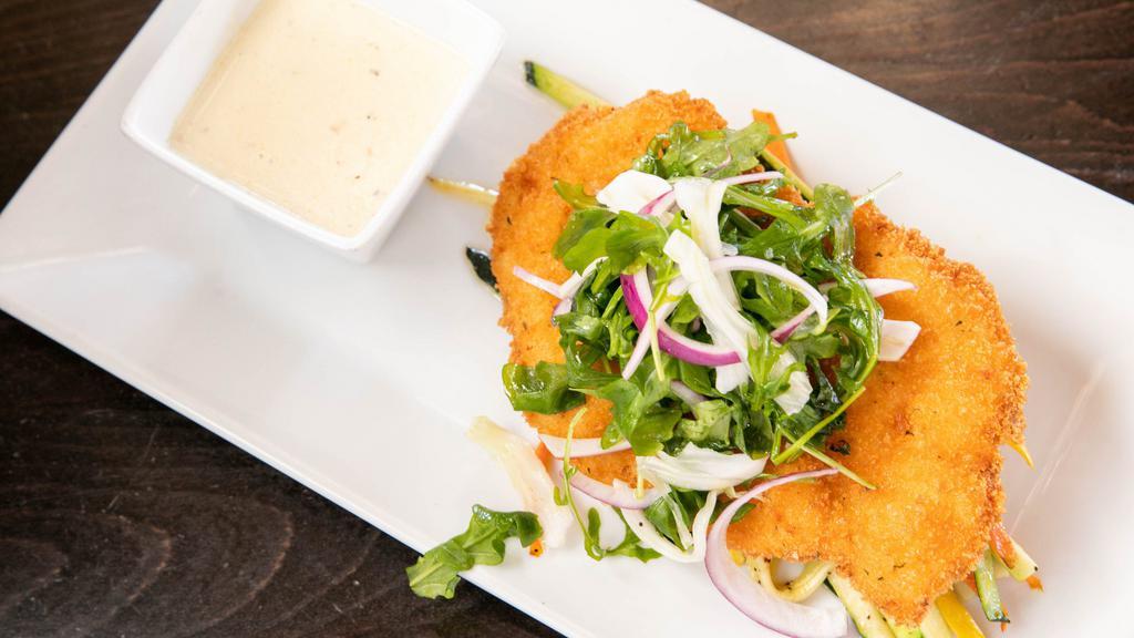 Milanese · parmesan crusted, lemon, extra virgin olive oil, dressed baby arugula, fennel, red onions. Protein: chicken, flounder.