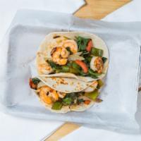 Shrimp Taco · 1 grilled shrimp taco topped with bell peppers, spinach and onions.
