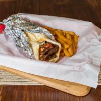 Lamb Gyro · Juicy Lamb Gyro with lettuce,onion,tomato, red sauce and white sauce wrapped in pita