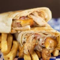 Lamb Shawarma · Tortilla Wrap filled Juicy Lamb, tomatoes, lettuce, onion white sauce and red sauce.