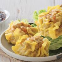 ​Steamed Dumpling (5) · Combine the ground chicken, shrimp, chopped scallions, water chestnuts, and all the seasonin...