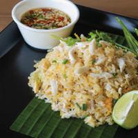 Fresh Crabmeat Fried Rice · Fresh crabmeat stir-fried with jasmine rice, scallions, onions,
and egg. (caution may contai...