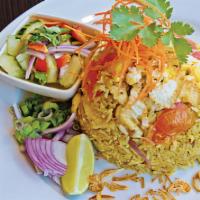 Curry Fried Rice · Stir-fried rice with egg, ginger, tomatoes, 
and red onions (choice of chicken, beef, or tofu)