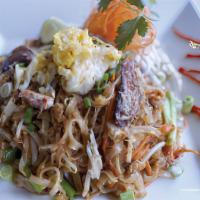 Spicy Crabmeat Noodle · Rice noodles stir-fried with fresh crabmeat, egg, carrots, scallions, bean sprouts, and garl...