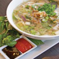 Vietnamese Noodle Soup · A fragrant clear broth noodle soup with onions, scallions, and a side of bean sprout and bas...