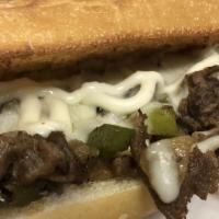 Philly Cheese Stake · Beef shredded and cooked on grill with toasted hoagie with mayo, bell peppers, onions, chees...
