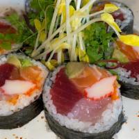 House Roll (6) · Tuna, salmon, yellowtail, crab meat and avocado, masago, seaweed outside.