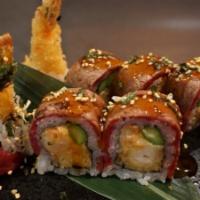Dancing Filet Roll · Shrimp tempura, crawfish salad, asparagus topped with seared filet mignon with special Japan...