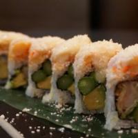 Coconut Roll · Coconut shrimp, asparagus inside topped with crawfish salad and crab mix with toasted coconu...