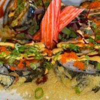 114 Roll (6) · Spicy. Deep fried roll with salmon, crab meat, cream cheese, eel and tamago topped with scal...