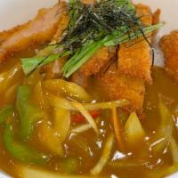 Japanese Katsu Curry · Panko breaded chicken, pork loin or red snapper cutlet with Japanese curry on top of steamed...