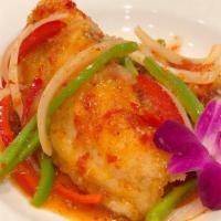 Sweet & Sour Red Snapper · Crispy snapper filet with bell pepper, onion, bamboo shoot, carrot in our special sweet chil...
