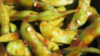 Spicy Edamame · Lightly salted, steamed edamame, tossed with a spicy sauce.