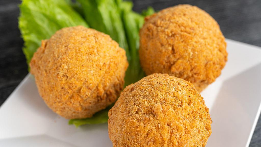 Boudin Balls · Hand breaded, deep fried boudin balls.  Served with ranch.