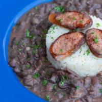 Red Beans & Rice · Andouille sausage and red kidney beans stewed and mixed served with rice.