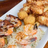 Shrimp Cuatro · 3 fried, 3 coconut, 3 diablo & 3 grilled shrimp served with fries and fried rice.