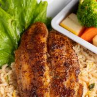 Blackened Catfish · Served with shrimp fried rice (vegetables and green beans or side salad) and toast.