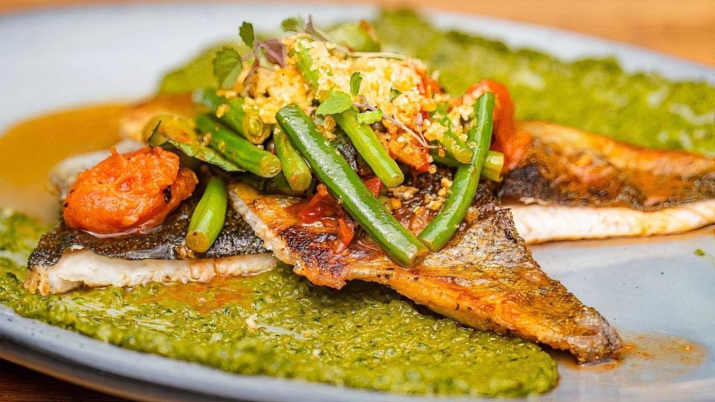 Rainbow Trout · Wood roasted tomato, french green beans, olive, caper, salsa verde,
potato crunch