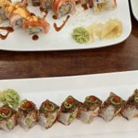 Shaggy Dog Roll (9 Piece) · Tempura shrimp, topped with imitation crab, spicy mayo, eel sauce, and tempura flakes.