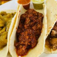 Asado De Puerco / Spicy Pork · Asado de Puerco is a spicy pork tender meat.  This is one of our most requested tacos.  It i...