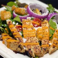Buffalo Chicken Salad · Breaded Gardein chicken, mozzarella cheese, leafy greens, ranch, tomato, onion.