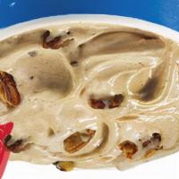 Turtle Pecan Blizzard · Pecan pieces blended with chocolate, rich caramel, and creamy vanilla soft serve.