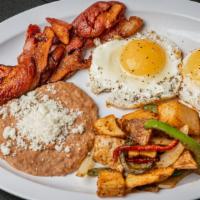 Breakfast Plate · Egg, beans, potatoes and a choice of meat.
(chorizo, ham, bacon, or potatoes)