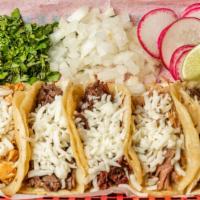 Taco Plate · Five Tacos and One side. 
choose any meats and side.