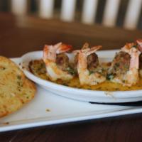 Crab Stuffed Shrimp Bites · Butterflied shrimp,  crab stuffing, and  toast points.