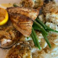 Seafood Bayfront Sampler · Rice pilaf and  crisp green beans with  