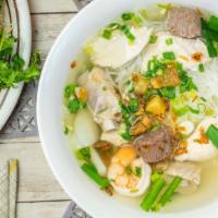 Combination Noodle Soup/ Hủ Tiếu Thập Cẩm (Khô/Nước) · Chicken, shrimp, squid, pork rib, and rice noodle served dry with sauce or in noodle soup.