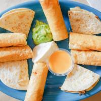 Sample Plate · Combination of flautas (2), fajita changuitos (2), small quesadilla, sour cream, guacamole a...