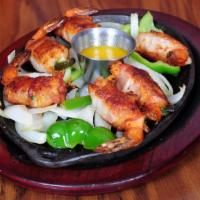 Camarones Adobados · (6) Jumbo shrimp stuffed with monterey cheese, slice of jalapeno wrapped with bacon.