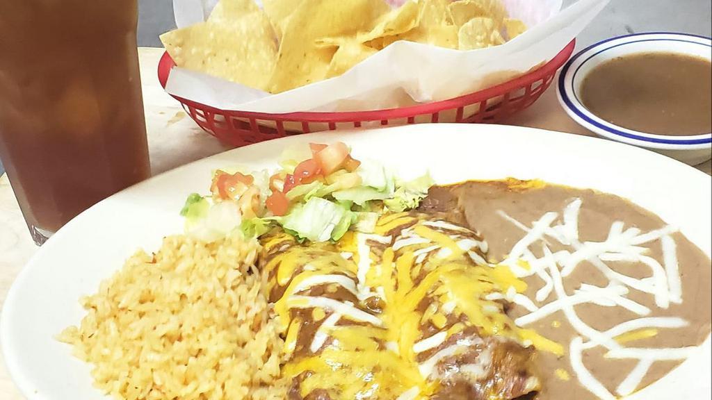 Enchiladas De Camarones Platter · Two corn tortillas rolled and filled with shrimp topped with ranchero sauce or sour cream. Served with rice and beans.