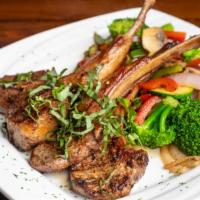 10 Oz Grilled Lamb Chops · 10 Oz of Australian lamb chops grilled to perfection, served with sautéed mix vegetables  / ...