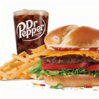 Large Griddled Cheese Burger Combo · Includes large French Fries and your choice of a large drink.