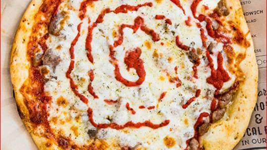 Lasagna Pizza · Ricotta, sauce, beef, Italian sausage, and cheese.
