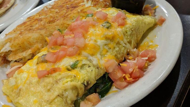 Veggie Omelette · Broccoli, diced bell pepper, mushrooms, onions and tomatoes.