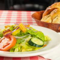 Garden Salad · Mixed greens, tomatoes, cucumbers, red onions and pepperoncini.