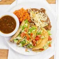 Tacos · 4 Tacos (Picadillo Plain), Arroz, Frijoles y ensalada.