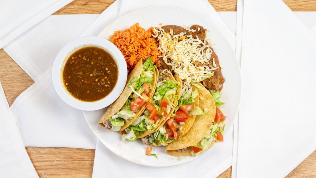Tacos · 4 Tacos (Picadillo Plain), Arroz, Frijoles y ensalada.