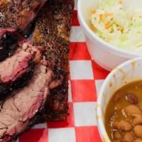 Smoked Bbq Brisket Plate · Scrumptuous BBQ Brisket plate comes with two sides potato salad and baked bean