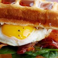 One Meat Of Your Choice Ham,Bacon Or Sausage Egg & Cheese Waffle Sandwich · Ham, eggs and Cheddar cheese.