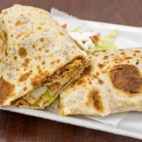Burrito · A large flour tortilla filled with your choice of meat, lettuce, tomato and refried beans.