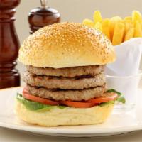 Triple Burger · Three, juicy, grilled 1/4 pound all beef patties (yes, you read that right!)  topped with fr...
