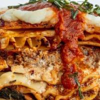Impossibly Cheese Lasagna · Multi Layered Lasagna with house made ricotta, mozzarella & Parmesan, stuffed with Italian s...