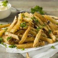 Leonardo'S Parmesan Fries · Fresh cut fries, cooked and seasoned with Parmesan cheese and other spices. Served with basi...