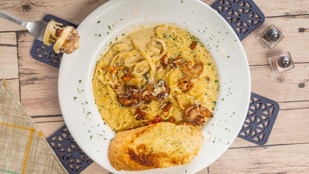 Smookies Cajun Pasta · Served with crawfish toasted creamy Alfredo sauce with fettuccine noodles.
