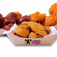 Wings (75) · Choose 75 Wings boneless, classic or mix and Match, five flavors.