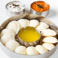 Mini Ghee Idli Sambar (12) · Small idli's served with sambar (lentil stew) and ghee (clarified butter)